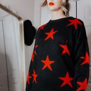 Black with stars oversized sweater from Revolve